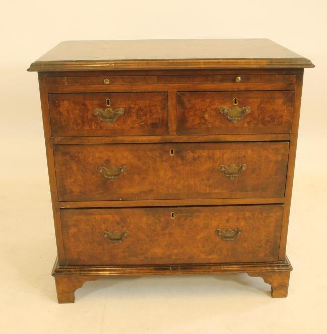 A SMALL WALNUT CHEST Image
