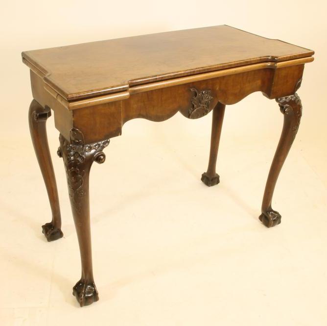 A WALNUT FOLDING CARD TABLE Image