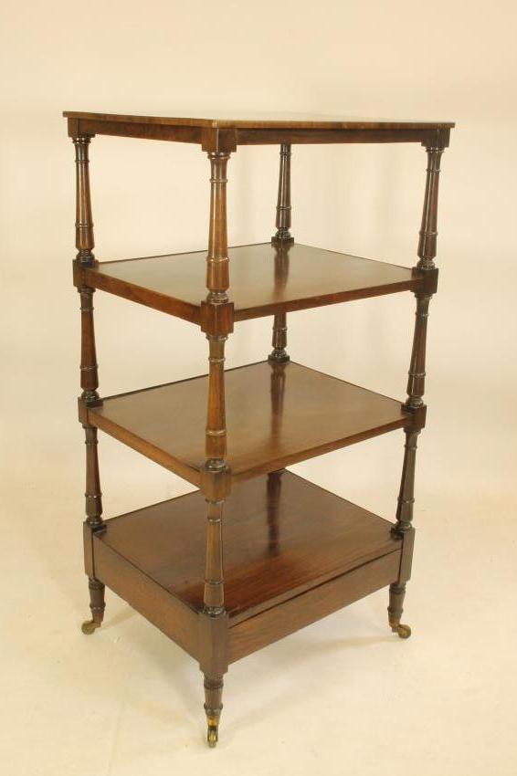 A LATE GEORGIAN KINGWOOD WHATNOT of four tier oblong form with baluster and ring turned uprights Image