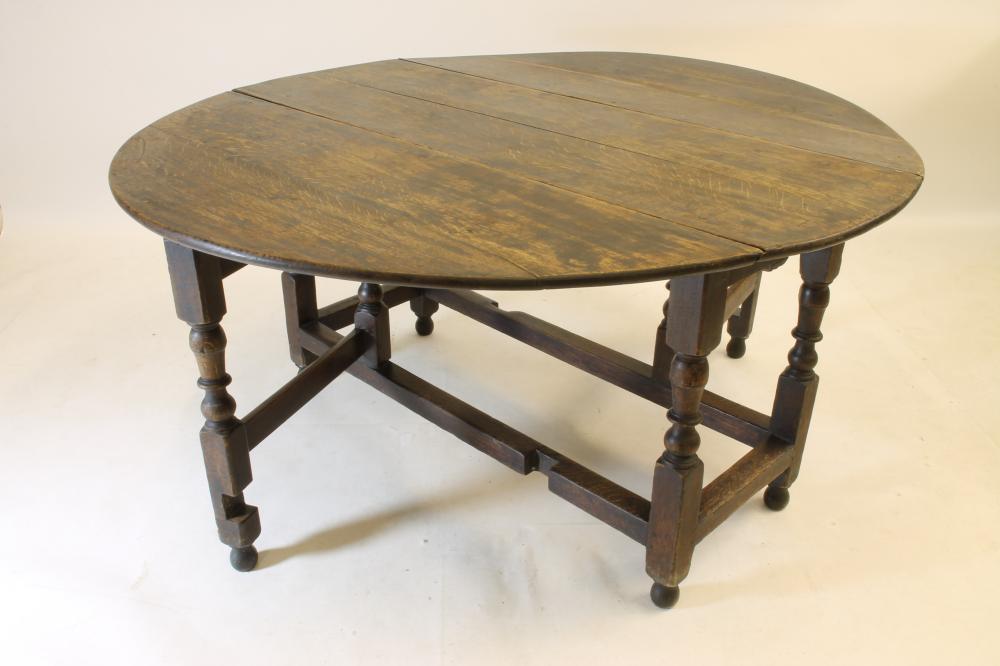 A GEORGIAN OAK GATELEG TABLE Image