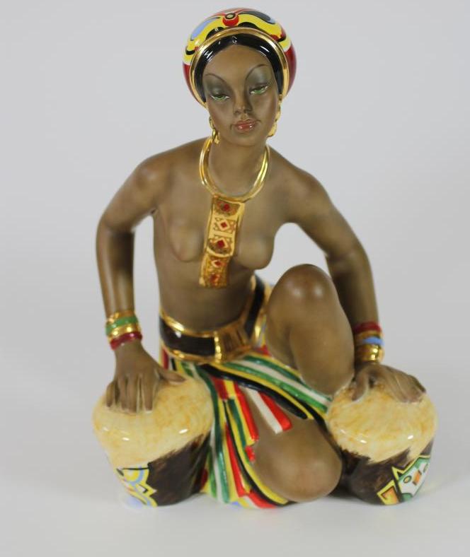 AN ITALIAN EARTHENWARE FIGURE Image