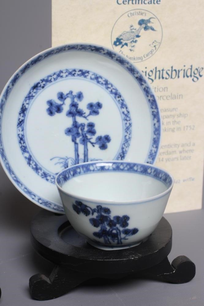 A PAIR OF NANKING CARGO CHINESE PORCELAIN SMALL TEA BOWLS AND SAUCERS each painted with a prunus Image