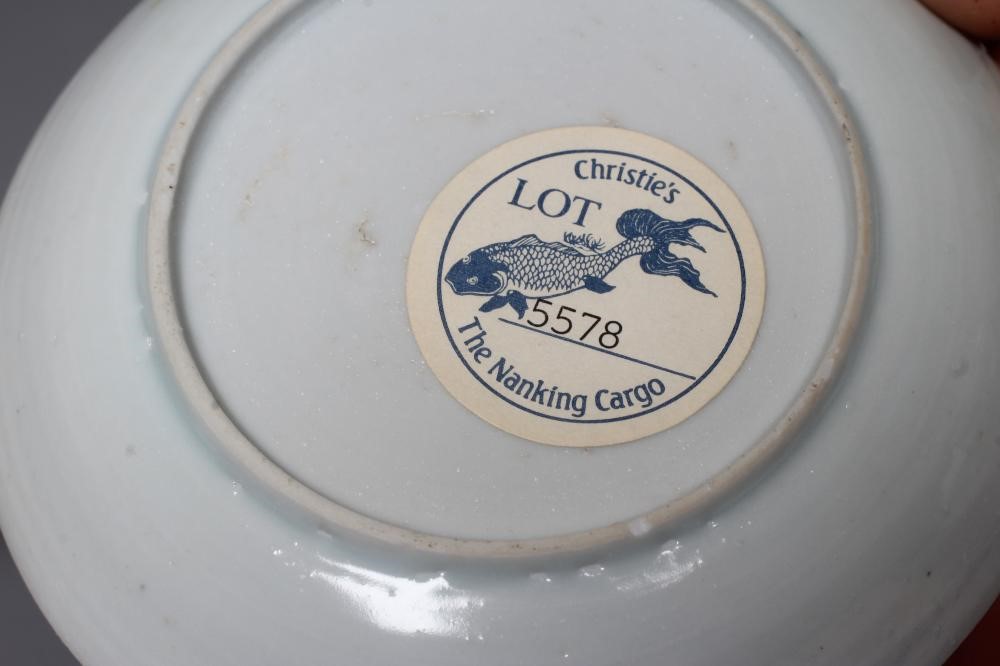 A PAIR OF NANKING CARGO CHINESE PORCELAIN SMALL TEA BOWLS AND SAUCERS each painted with a prunus Image