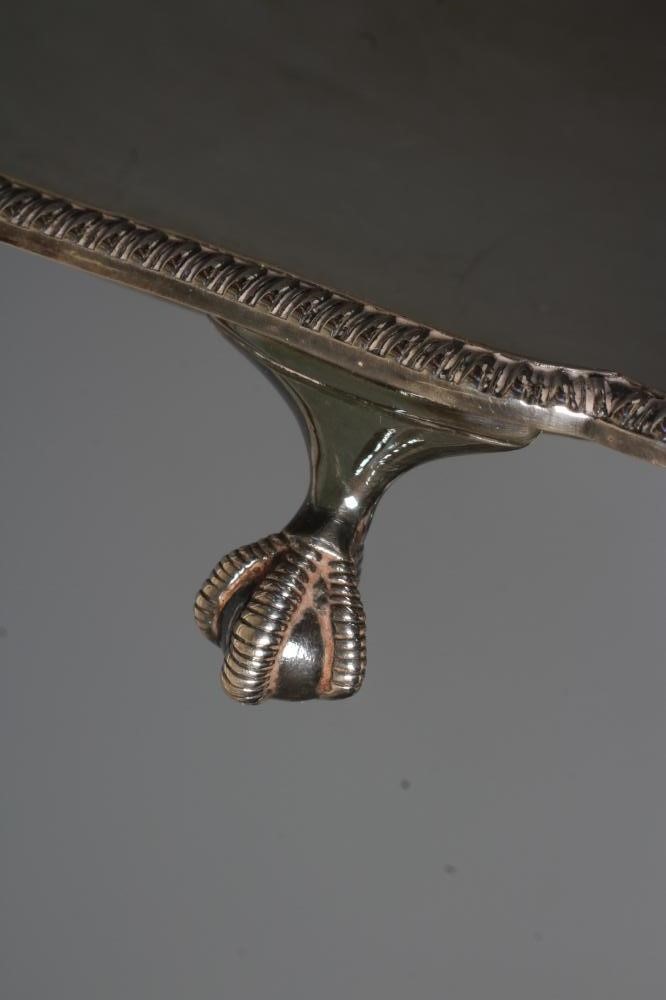 AN ELIZABETH II SILVER SALVER by Mappin & Webb Image