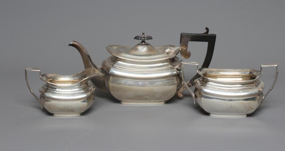 A GEORGE V SILVER THREE PIECE TEA SERVICE by William Aitkin Image