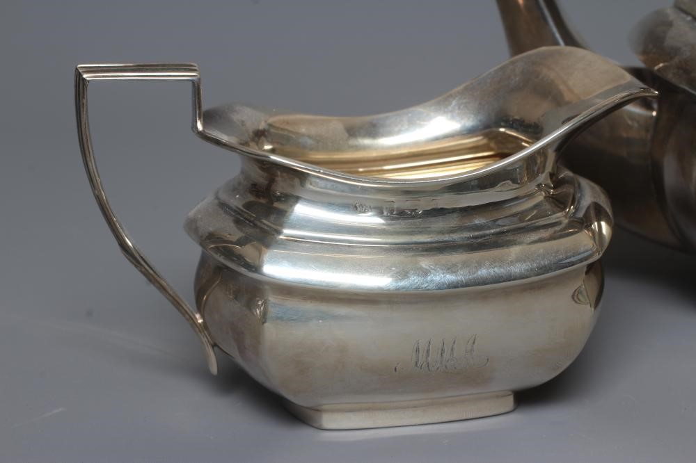 A GEORGE V SILVER THREE PIECE TEA SERVICE by William Aitkin Image