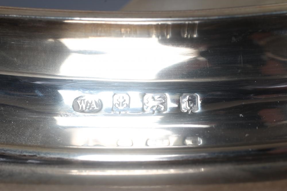 A GEORGE V SILVER THREE PIECE TEA SERVICE by William Aitkin Image