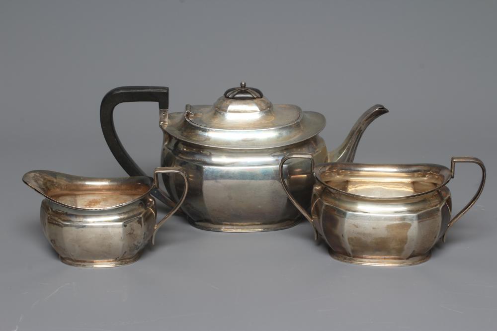A GEORGE V SILVER THREE PIECE TEA SERVICE by The Atkin Bros. Image