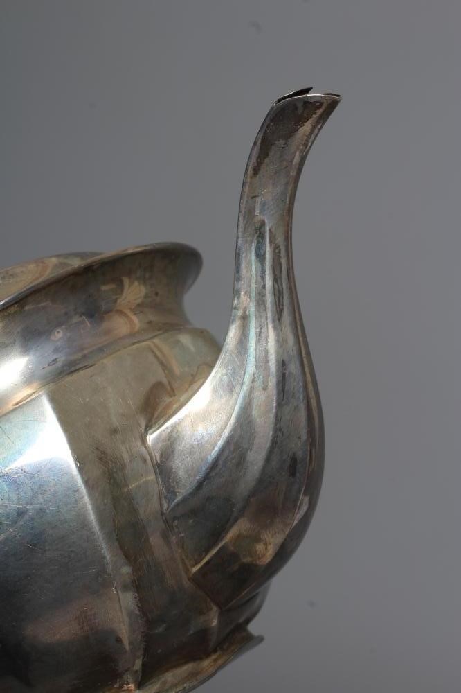 A GEORGE V SILVER THREE PIECE TEA SERVICE by The Atkin Bros. Image