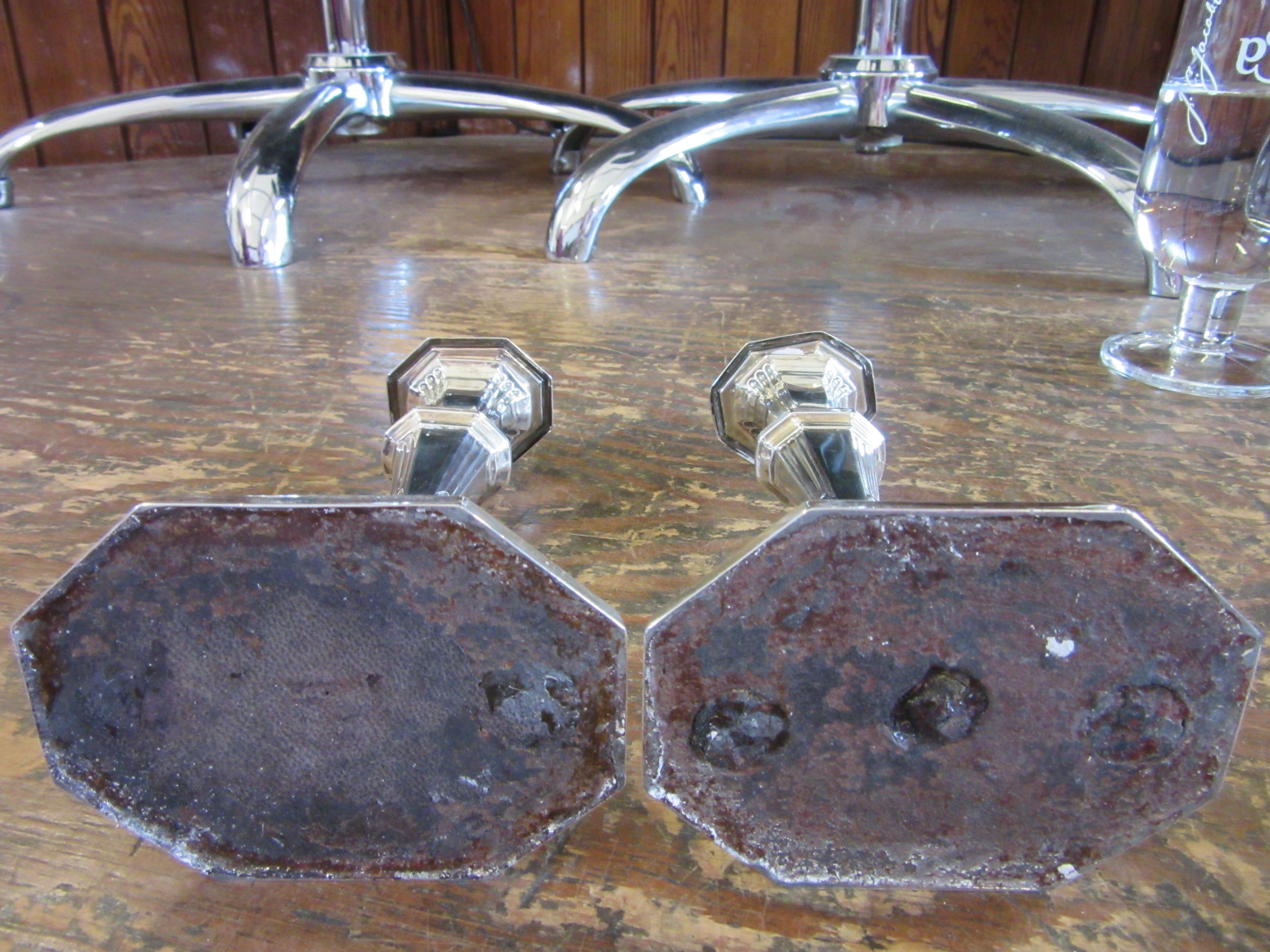 A COMPOSITE PAIR OF GEORGE V SILVER CANDLESTICKS by Harrison Bros. & Howson Image