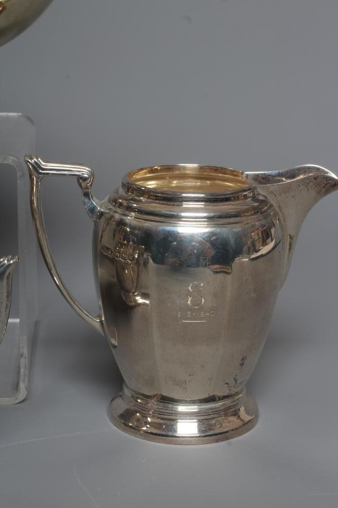 A GEORGE VI SILVER FOUR PIECE TEA AND COFFEE SERVICE by Fattorini & Sons Image
