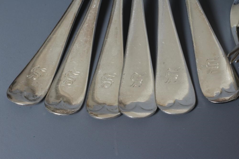 A GEORGE V SILVER OLD ENGLISH PATTERN PART TABLE SERVICE by John Round & Son Ltd. Image