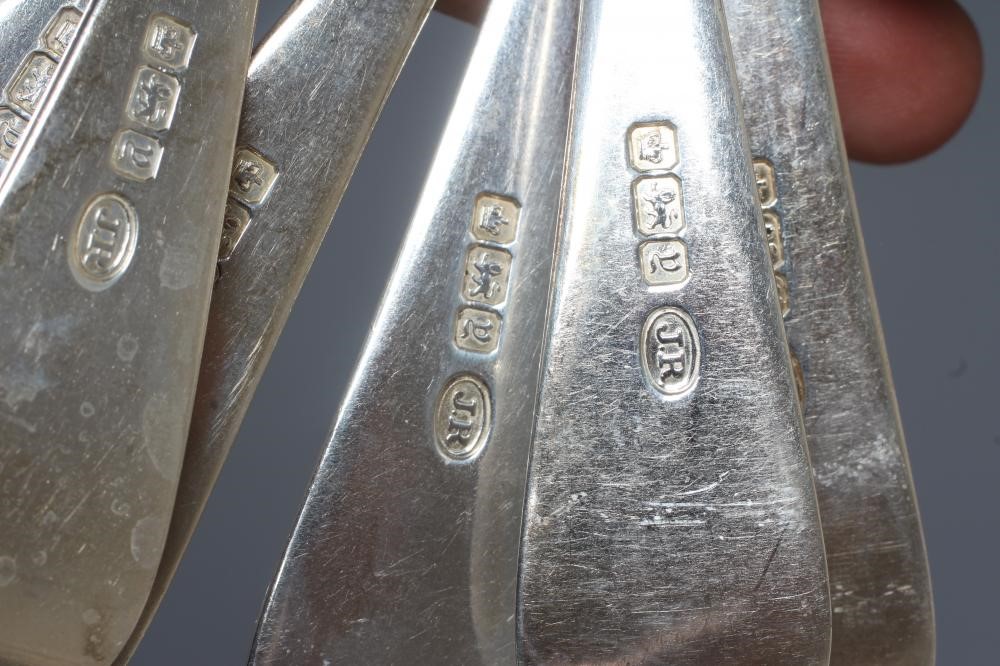 A GEORGE V SILVER OLD ENGLISH PATTERN PART TABLE SERVICE by John Round & Son Ltd. Image