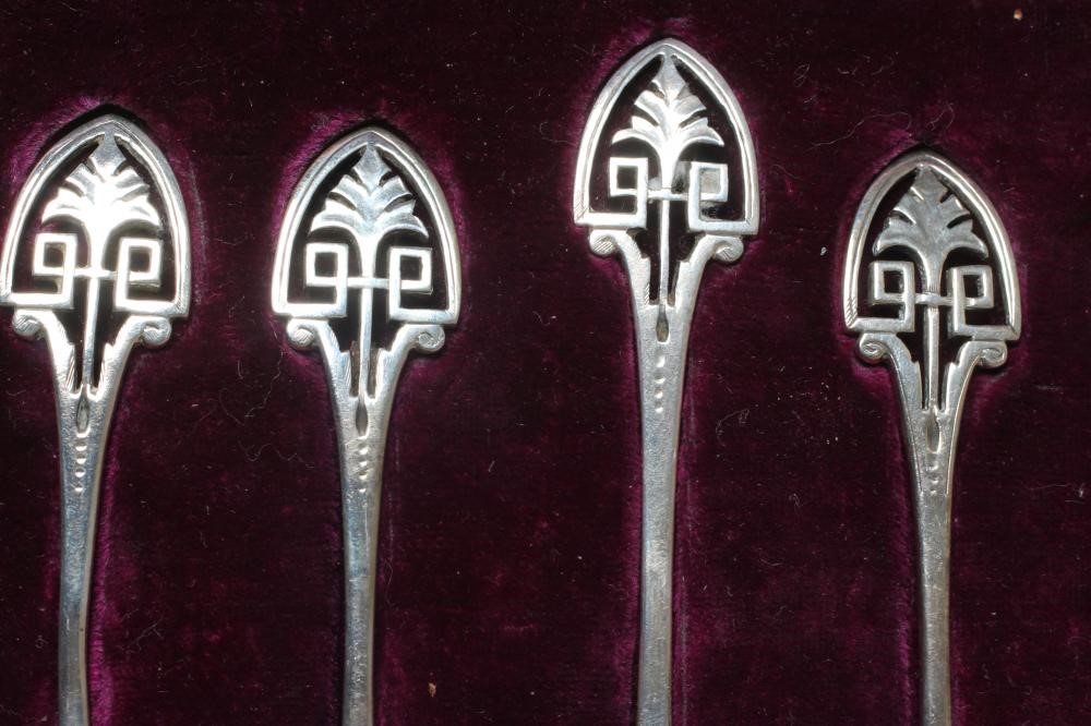 A SET OF FOUR VICTORIAN SILVER SALT SPOONS AND A MATCHING MUSTARD SPOON by Jehoiada Alsop Rhodes Image