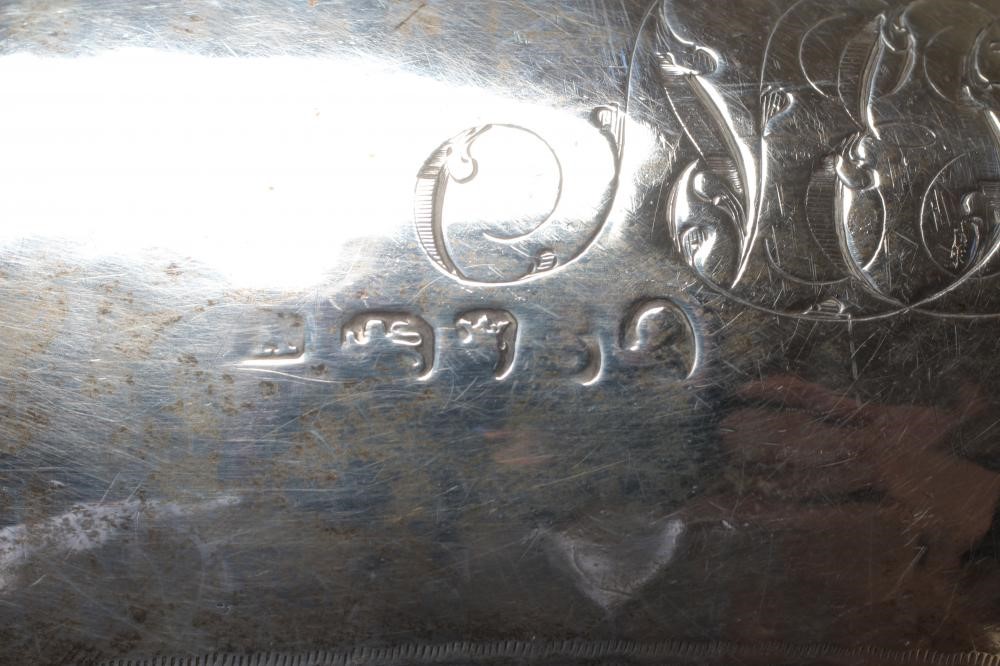 A GEORGE III SILVER TEAPOT Image