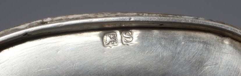 A GEORGE III SILVER TEAPOT Image