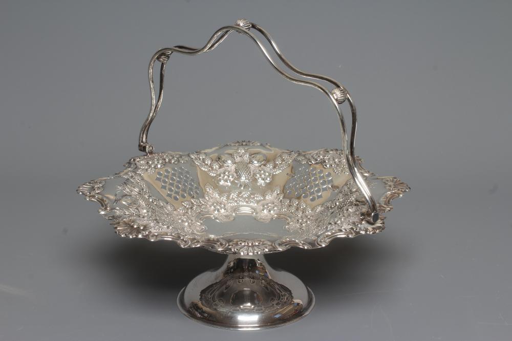 AN EDWARDIAN SILVER BASKET by John Henry Potter Image