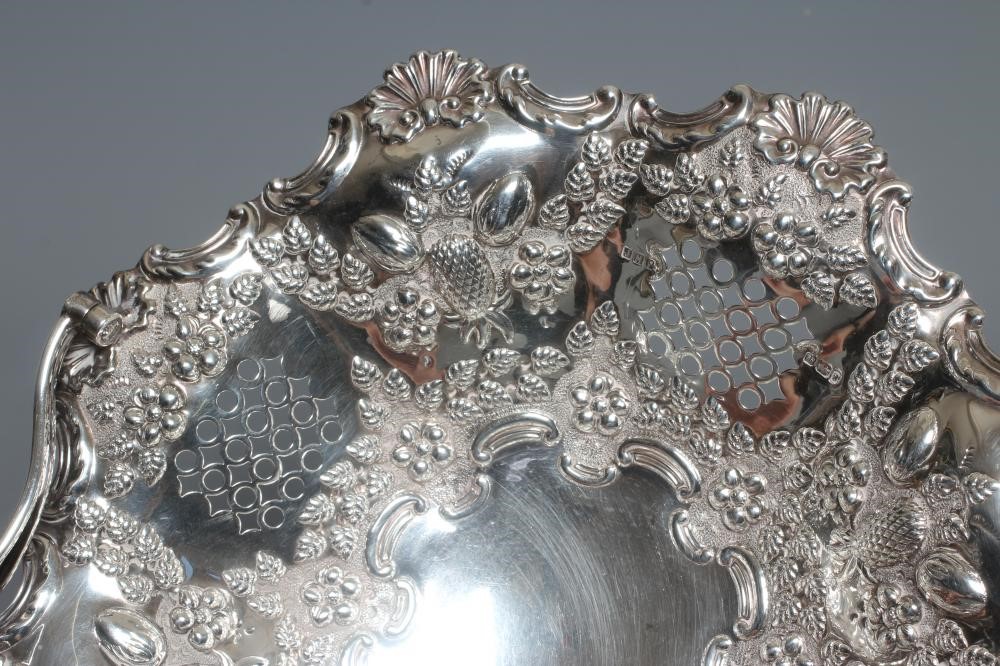 AN EDWARDIAN SILVER BASKET by John Henry Potter Image