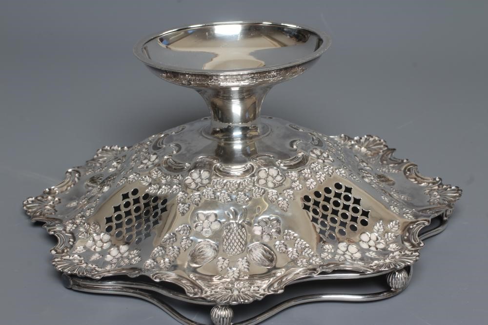 AN EDWARDIAN SILVER BASKET by John Henry Potter Image