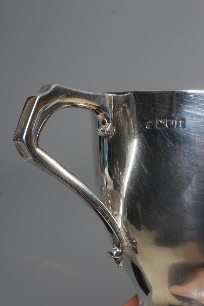 AN EDWARDIAN SILVER TROPHY CUP by Wakely & Wheeler Image