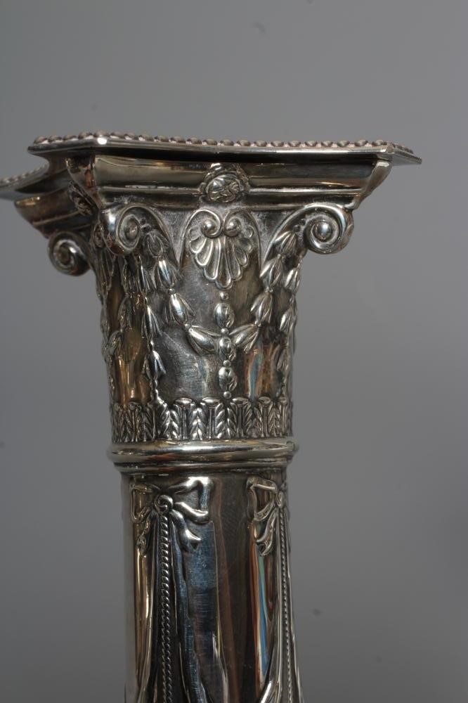 A PAIR OF EDWARDIAN SILVER SMALL CORINTHIAN COLUMN CANDLESTICKS by Thomas Bradbury Image