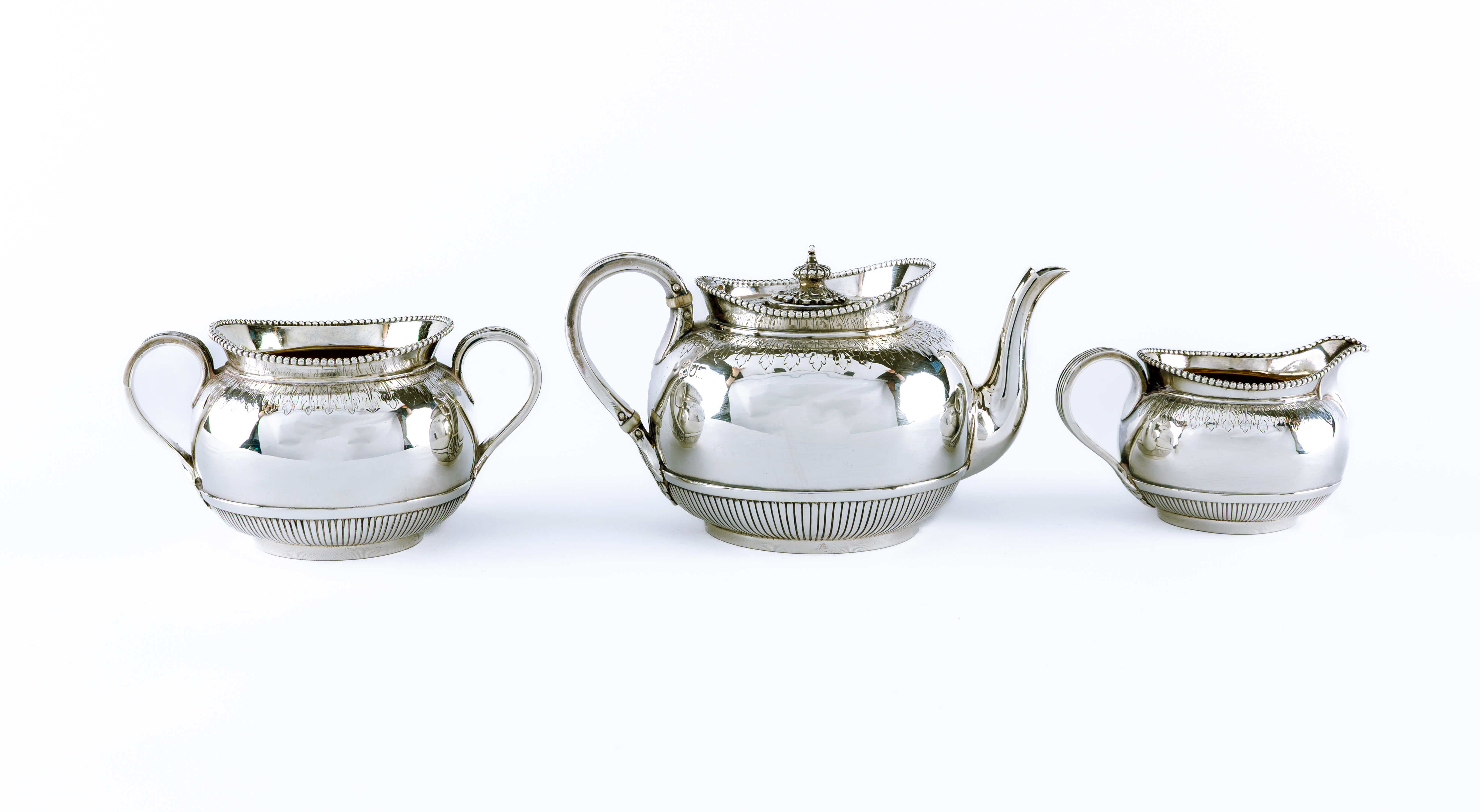 A COMPOSITE VICTORIAN/EDWARDIAN SILVER BACHELOR'S THREE PIECE TEA SERVICE by George Fox Image