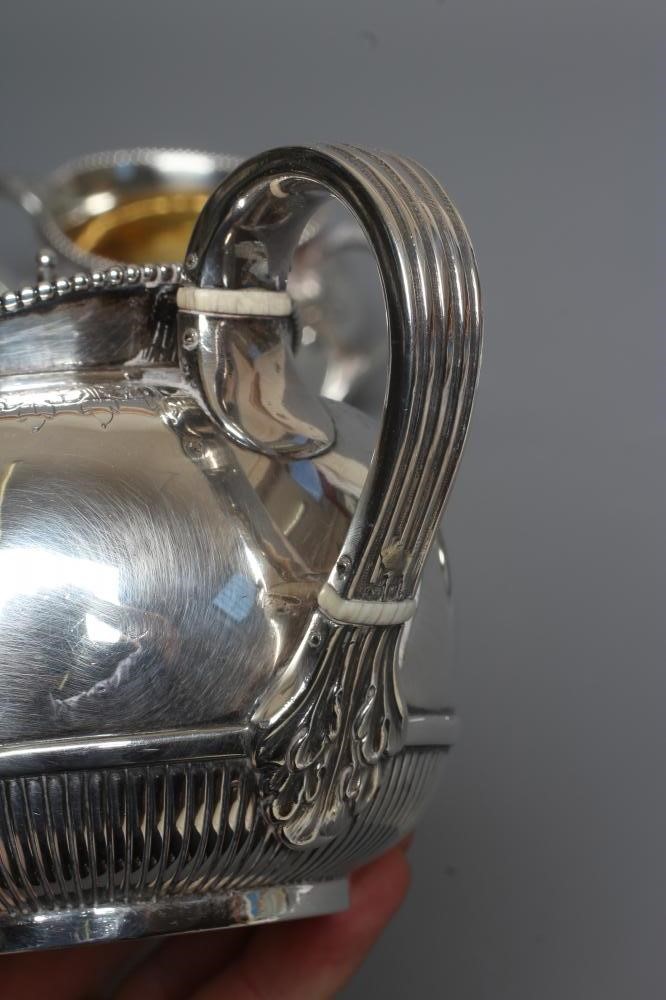 A COMPOSITE VICTORIAN/EDWARDIAN SILVER BACHELOR'S THREE PIECE TEA SERVICE by George Fox Image