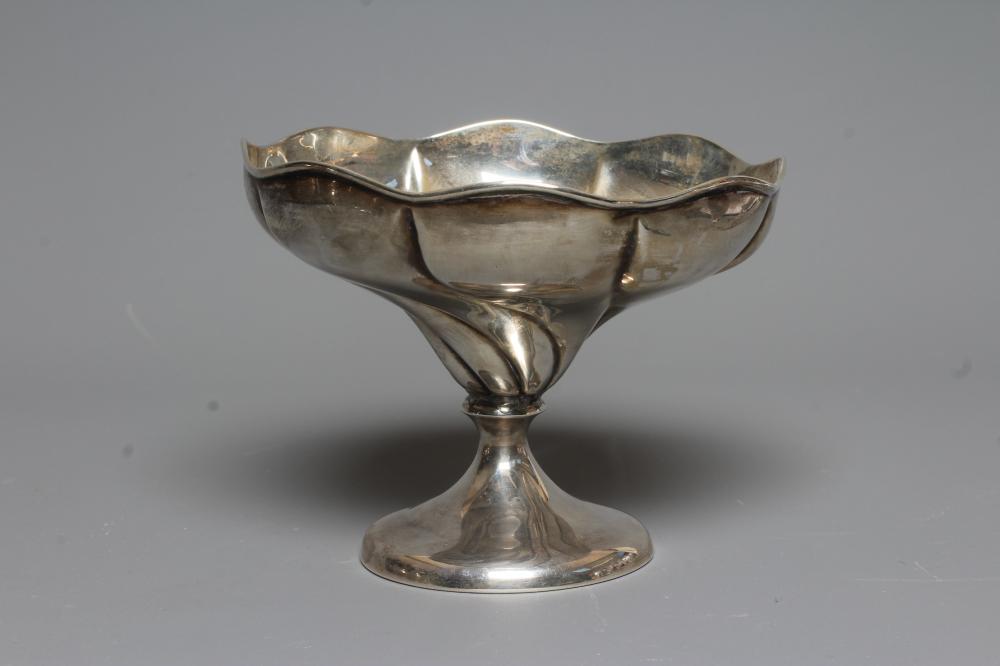 AN EDWARDIAN SILVER PEDESTAL BOWL by John Round & Son Ltd., Sheffield 1906, of wrythen fluted Image