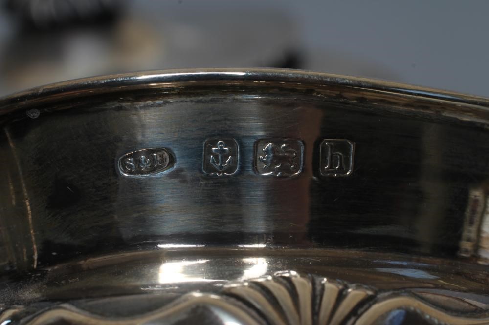 AN EDWARDIAN SILVER THREE PIECE TEA SERVICE by Sanders & Hill Image