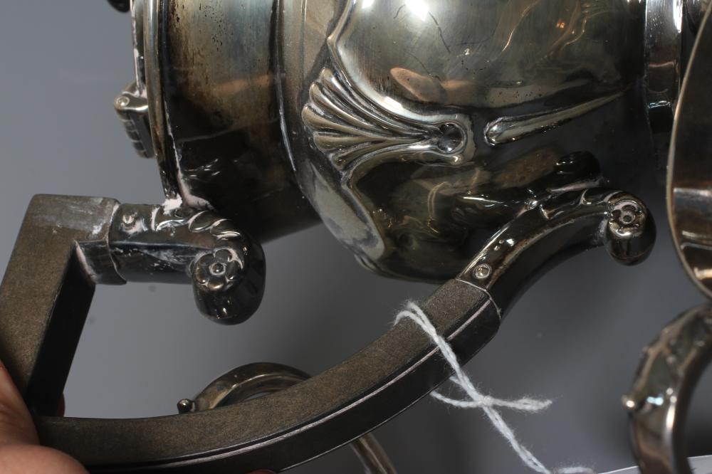 AN EDWARDIAN SILVER THREE PIECE TEA SERVICE by Sanders & Hill Image