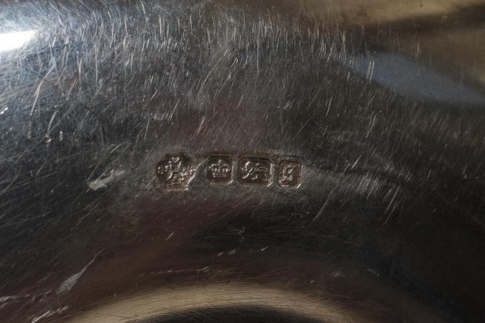 AN EDWARDIAN SILVER CHAMBERSTICK by William Hutton & Sons Ltd. Image