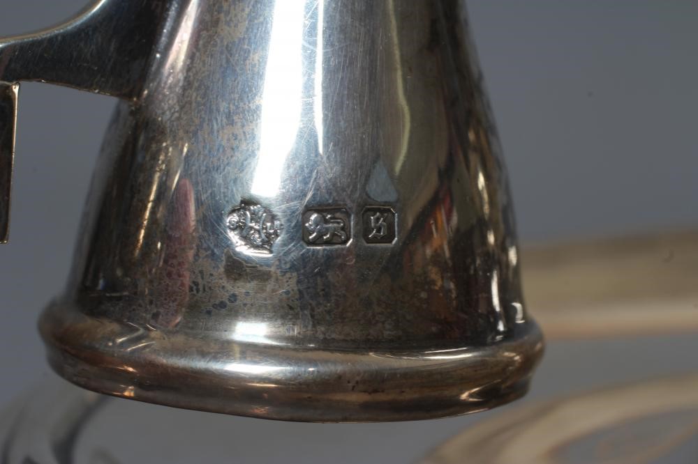 AN EDWARDIAN SILVER CHAMBERSTICK by William Hutton & Sons Ltd. Image