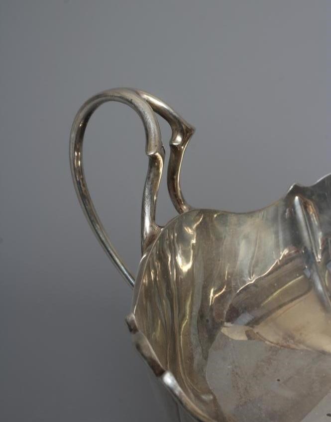 AN EDWARDIAN SILVER TROPHY by Atkin Bros. Image