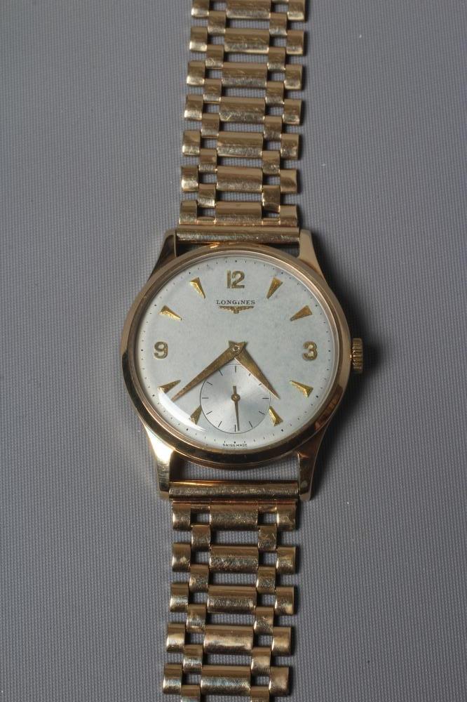A GENTLEMAN'S 9CT GOLD LONGINES WRISTWATCH Image