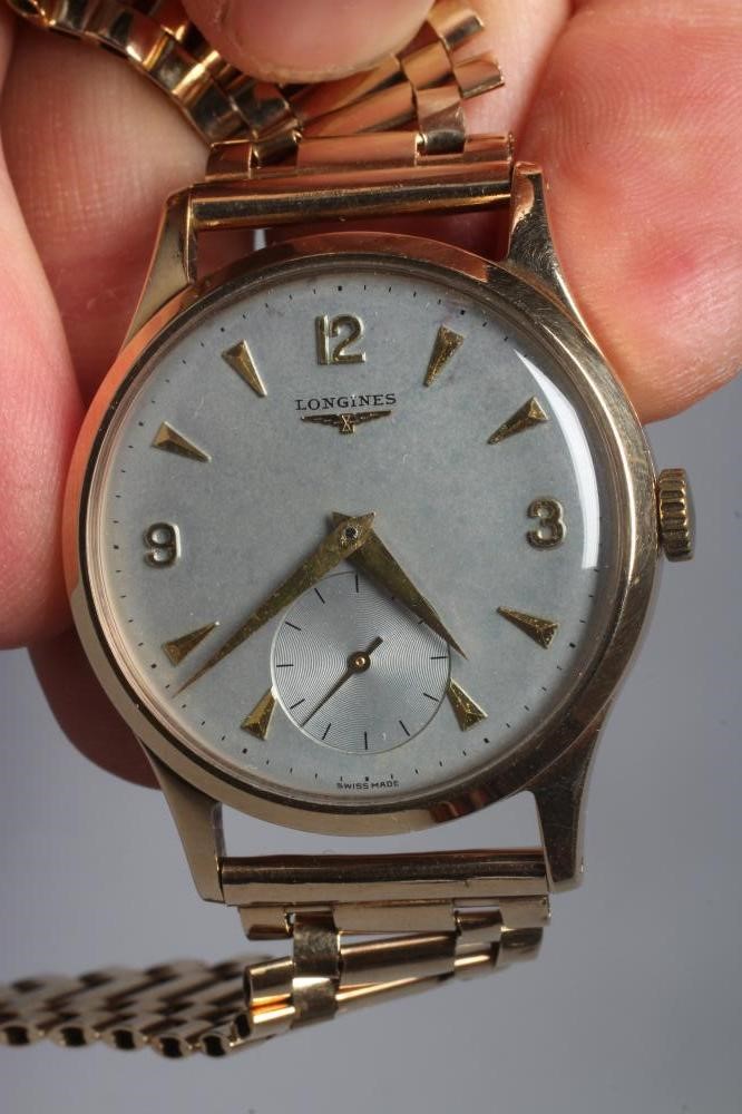 A GENTLEMAN'S 9CT GOLD LONGINES WRISTWATCH Image