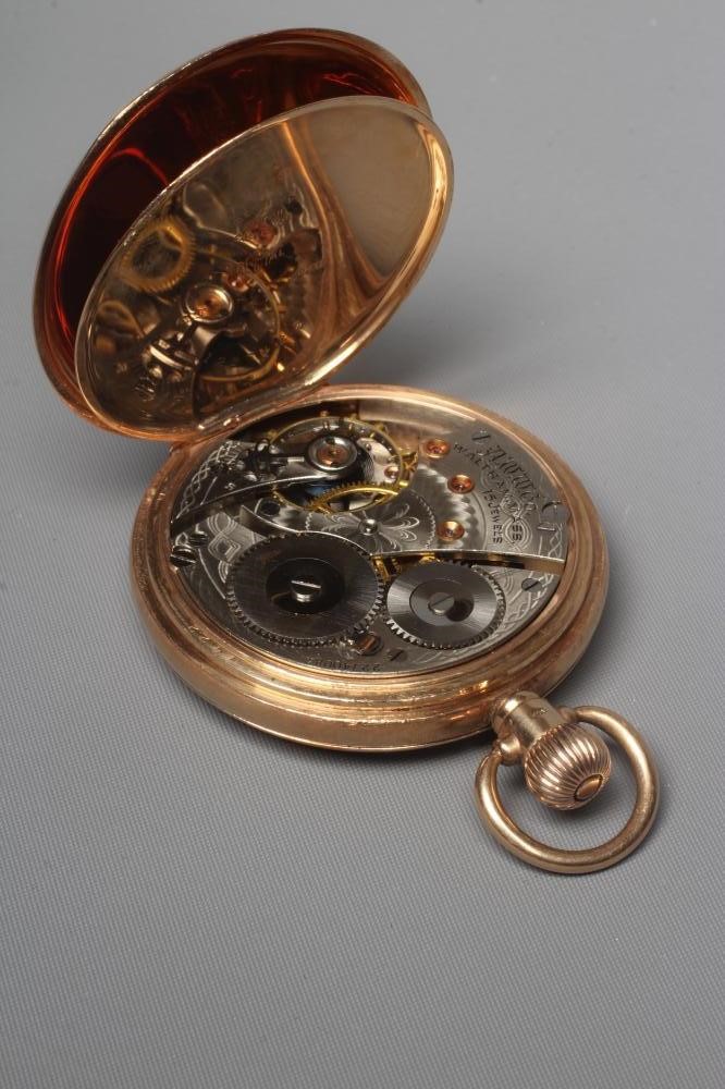 A 9CT GOLD WALTHAM TOP WIND HUNTER POCKET WATCH Image