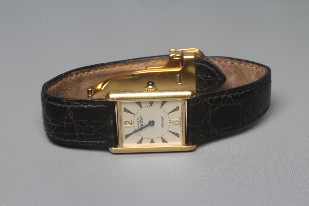 A LADY'S MUST DE CARTIER LIMITED EDITION SILVER GILT TANK WATCH Image