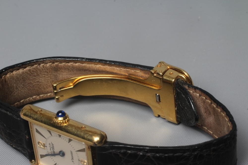 A LADY'S MUST DE CARTIER LIMITED EDITION SILVER GILT TANK WATCH Image