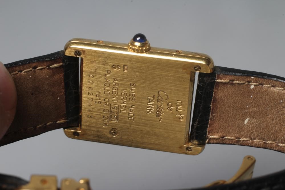 A LADY'S MUST DE CARTIER LIMITED EDITION SILVER GILT TANK WATCH Image