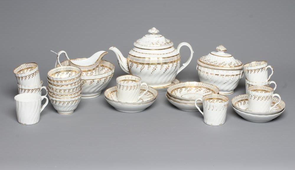 AN ENGLISH PORCELAIN PART TEA AND COFFEE SERVICE Image