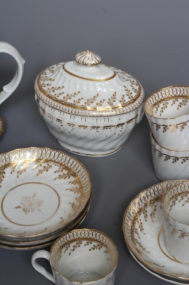AN ENGLISH PORCELAIN PART TEA AND COFFEE SERVICE Image