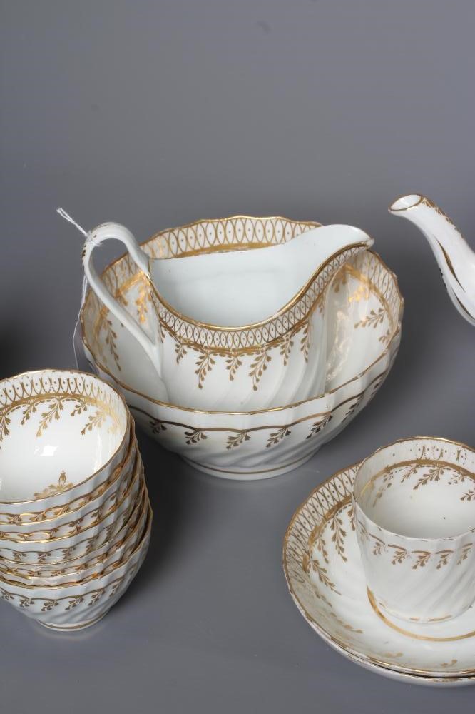 AN ENGLISH PORCELAIN PART TEA AND COFFEE SERVICE Image