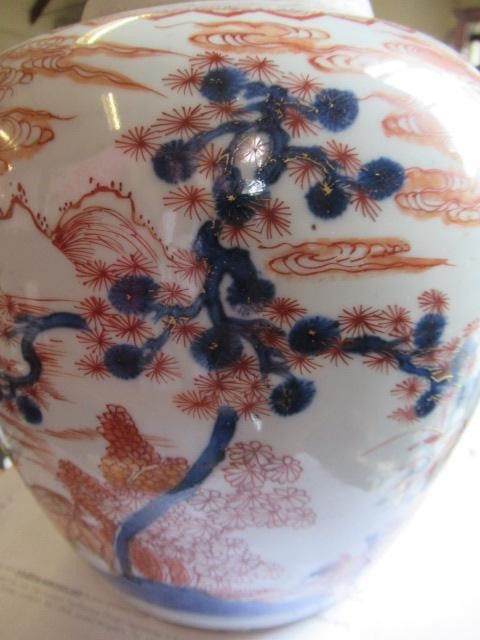 A CHINESE IMARI PORCELAIN JAR painted in underglaze blue and over painted in iron red and burnt Image