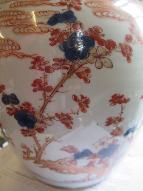 A CHINESE IMARI PORCELAIN JAR painted in underglaze blue and over painted in iron red and burnt Image