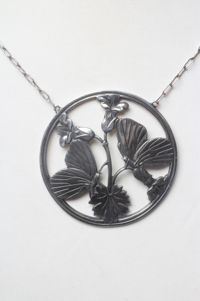 A GEORG JENSEN SILVER CIRCULAR MOONLIGHT BLOSSOM PENDANT designed by Arno Malinowski with two Image