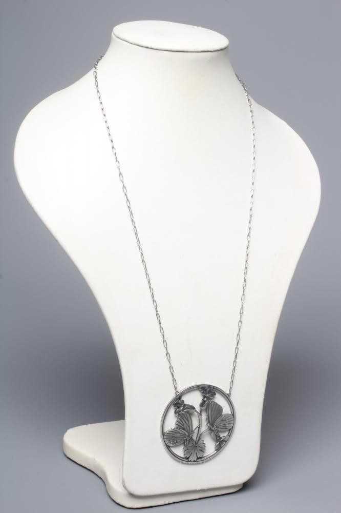 A GEORG JENSEN SILVER CIRCULAR MOONLIGHT BLOSSOM PENDANT designed by Arno Malinowski with two Image