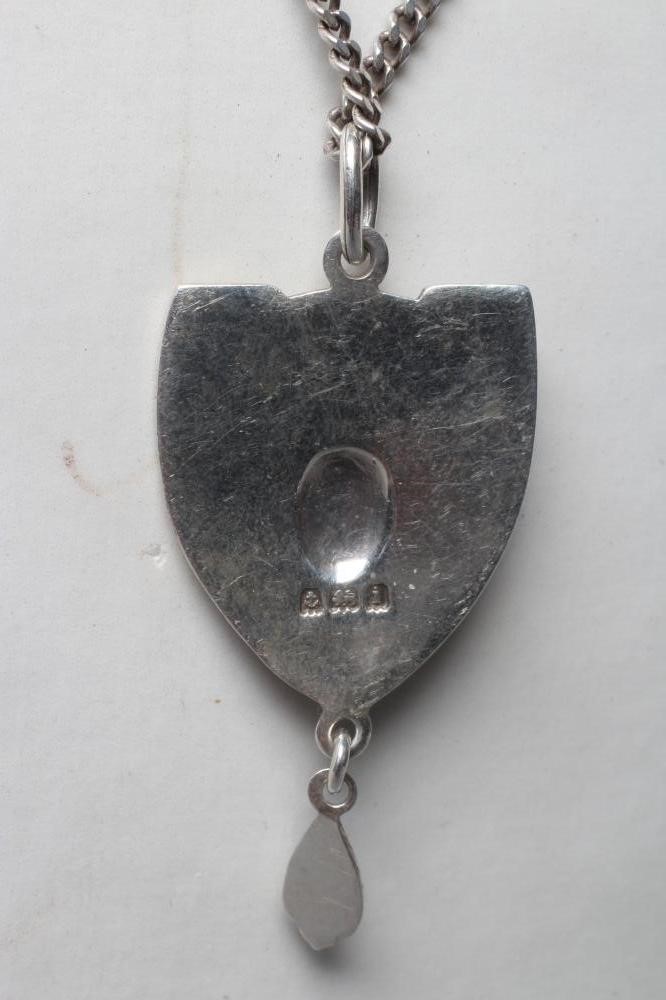 AN EDWARDIAN ARTS AND CRAFTS SILVER AND ENAMEL SHIELD PENDANT Image