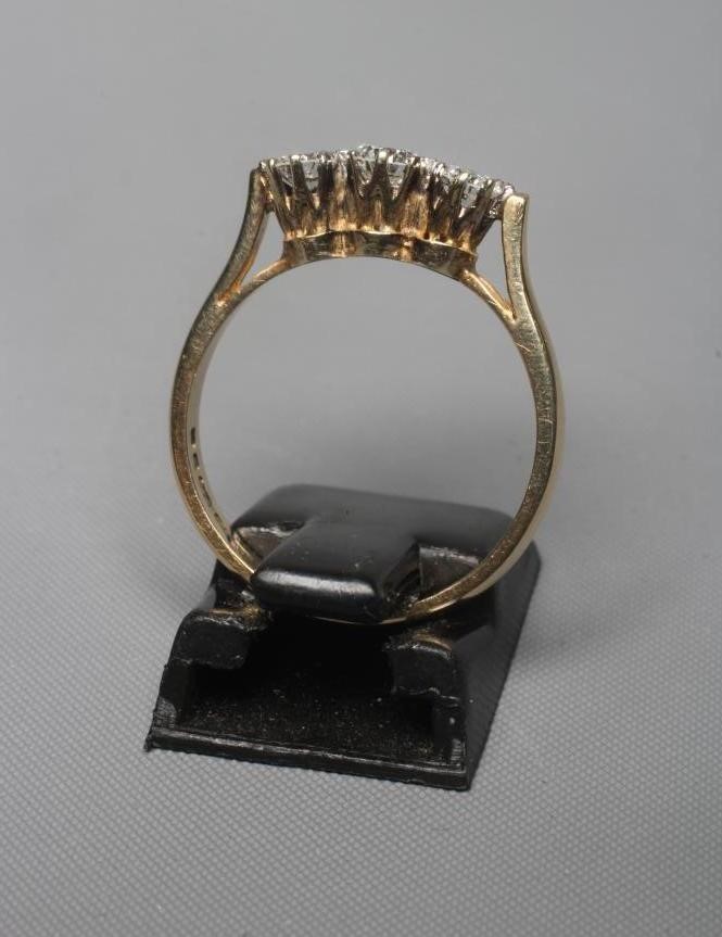 A THREE STONE DIAMOND RING Image