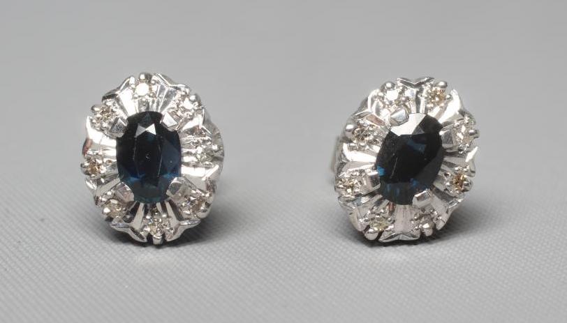 A PAIR OF SAPPHIRE AND DIAMOND OVAL CLUSTER EAR STUDS Image