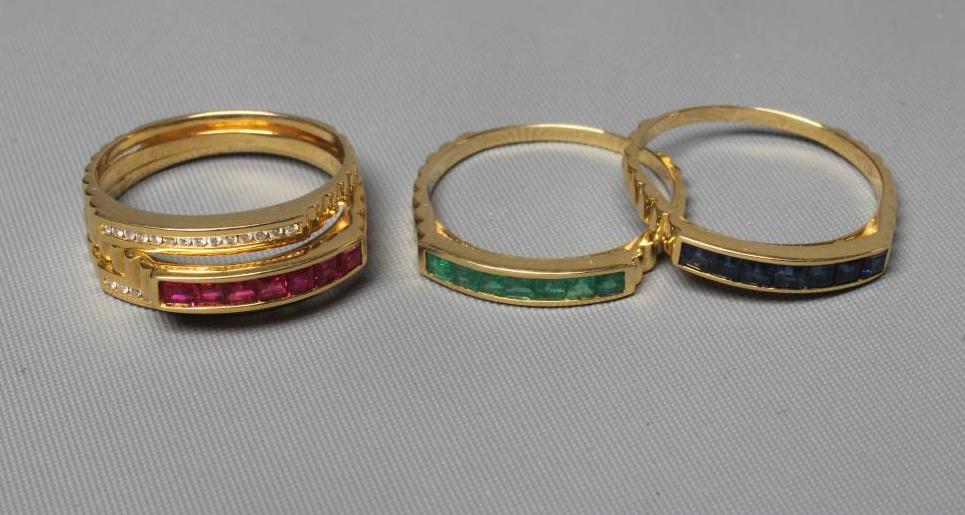 A MULTI-GEM STACKING RING Image